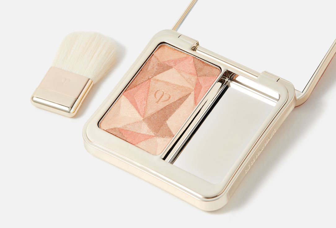 Clé de Peau Beauté Silky-smooth powder highlighter Luminizing Face Enhancer 203, Sunset's brilliance 10 g Clé de Peau Beauté Silky-smooth powder highlighter Luminizing Face Enhancer